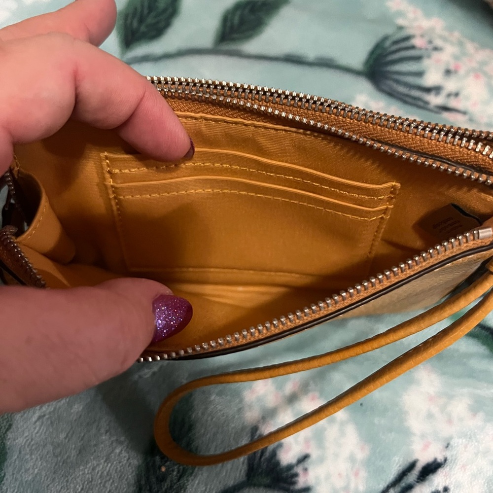 Coach authentic wallet w/wristlet yellow  silver hardware. Like new no defects